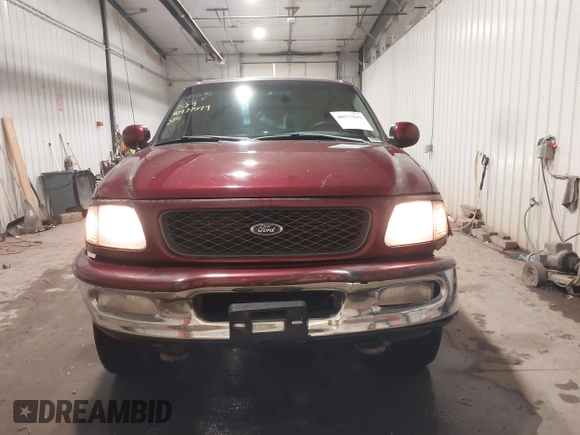 1998 Ford F-150 with VIN 1FTZX18W8WKA19037, listed as a IAAI auction lot 40977819 with 137,119 mi miles and . Bid and sale history available at DreamBid. Image 12.