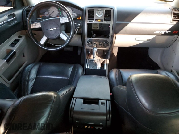 2006 Chrysler 300 C SRT8 with VIN 2C3KA73W06H228944, listed as a Copart auction lot 79866804 with 102,448 mi miles and Salvage Title. Bid and sale history available at carsss.com. Image 8.