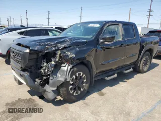 2024 Nissan Frontier SV with VIN 1N6ED1EJ4RN650125, listed as a Copart auction lot 65369825 with 14,282 mi miles and Salvage title. Bid and sale history available at DreamBid. Image 1.