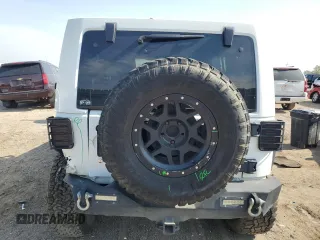 2015 Jeep Wrangler Unlimited Rubicon with VIN 1C4BJWFG1FL750561, listed as a Copart auction lot 60797075 with 95,677 mi miles and Salvage title. Bid and sale history available at DreamBid. Image 6.