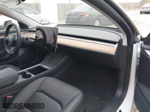 2021 Tesla Model 3 Long Range with VIN 5YJ3E1EB8MF019367, listed as a IAAI auction lot 41506094 with 14,257 mi miles and . Bid and sale history available at DreamBid. Image 5.