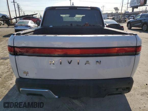 2022 Rivian R1T Adventure z VIN 7FCTGAAA9NN014280, wystawiony jako Copart lot #49723355 z przebiegiem 28 601 mil mil oraz Szkody całkowita. Historia ofert i sprzedaży dostępna na DreamBid. Obrazek 6.