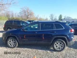 2015 Jeep Cherokee Latitude with VIN 1C4PJMCB1FW709560, listed as a IAAI auction lot 42035619 with 162,354 mi miles. Bid and sale history available at carsss.com. Image 14.