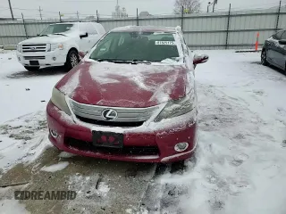 2010 Lexus HS 250h with VIN JTHBB1BA9A2005121, listed as a Copart auction lot 87825175 with 124,594 mi miles and Salvage Title. Bid and sale history available at DreamBid. Image 10.