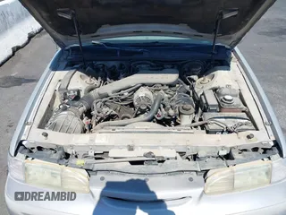 1995 Ford Thunderbird LX with VIN 1FALP62W4SH127020, listed as a IAAI auction lot 41823705 with 199,600 mi miles and . Bid and sale history available at DreamBid. Image 10.