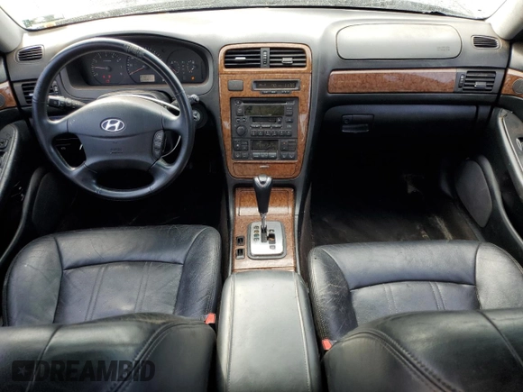 2005 Hyundai XG z VIN KMHFU45E05A380903, wystawiony jako Copart lot #81461064 z przebiegiem 139 777 mil mil oraz Szkoda całkowita • Salvage title. Historia ofert i sprzedaży dostępna na DreamBid. Obrazek 8.