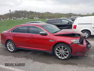 2013 Ford Taurus Limited with VIN 1FAHP2F84DG127859, listed as a IAAI auction lot 41913310 with 196,620 mi miles and . Bid and sale history available at DreamBid. Image 14.