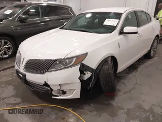 2014 Lincoln MKS with VIN 1LNHL9EK5EG605750, listed as a IAAI auction lot 41565308 with 167,835 mi miles. Bid and sale history available at carsss.com. Image 6.