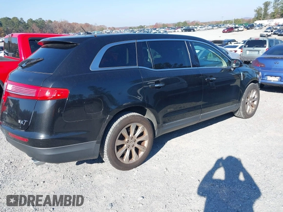 2013 Lincoln MKT with VIN 2LMHJ5FK9DBL56134, listed as a IAAI auction lot 41003176 with 292,292 mi miles and . Bid and sale history available at DreamBid. Image 4.