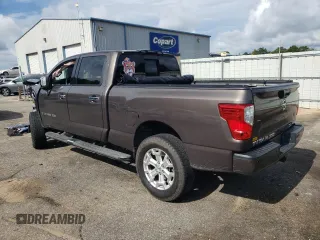 2017 Nissan Titan XD SL with VIN 1N6BA1F44HN510174, listed as a Copart auction lot 63245694 with 121,868 mi miles and Salvage Title. Bid and sale history available at carsss.com. Image 2.