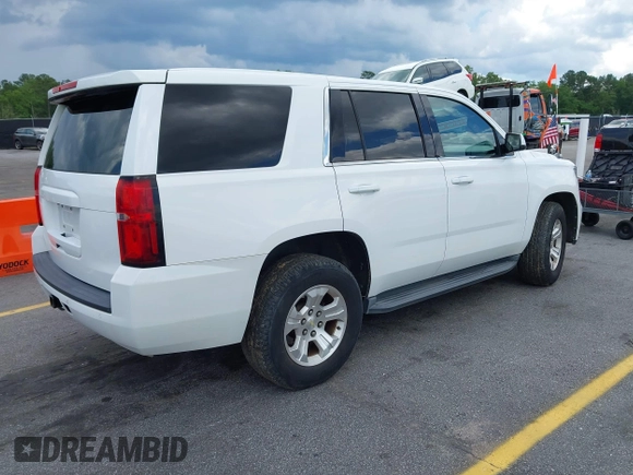 2015 Chevrolet Tahoe Commercial z VIN 1GNLC2EC1FR721538, wystawiony jako IAAI lot #42274601 z przebiegiem 138 991 mil mil oraz . Historia ofert i sprzedaży dostępna na DreamBid. Obrazek 4.
