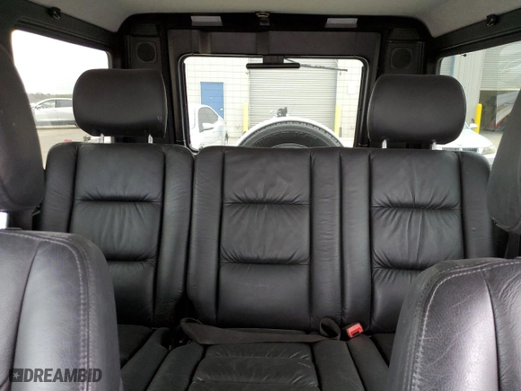 2002 Mercedes-Benz G-Class with VIN WDCYR49E12X133160, listed as a Copart auction lot 47310015 with 93,526 mi miles and Salvage Title. Bid and sale history available at carsss.com. Image 10.