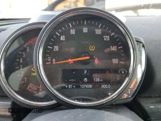 2018 MINI Clubman Cooper S with VIN WMWLN9C57J2E50986, listed as a Copart auction lot 77597404 with 107,606 mi miles and Salvage Title. Bid and sale history available at carsss.com. Image 9.