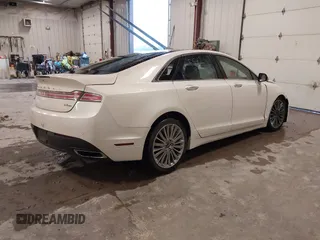 2016 Lincoln MKZ with VIN 3LN6L2JK0GR600486, listed as a IAAI auction lot 41943399 with 118,706 mi miles. Bid and sale history available at carsss.com. Image 4.