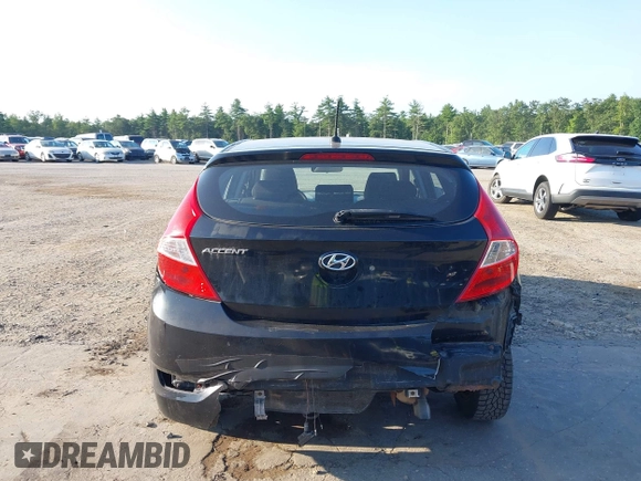 2013 Hyundai Accent GS with VIN KMHCT5AE7DU083576, listed as a IAAI auction lot 42693108 with 100,741 mi miles and . Bid and sale history available at DreamBid. Image 13.
