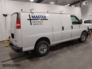 2019 GMC Savana Cargo Van with VIN 1GTW7AFG2K1300474, listed as a IAAI auction lot 41601074 with 85,158 mi miles. Bid and sale history available at carsss.com. Image 4.