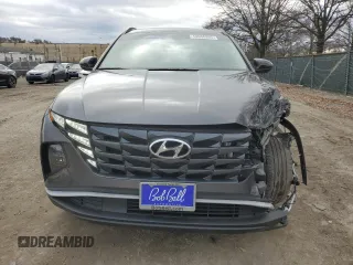 2022 Hyundai Tucson SEL with VIN 5NMJBCAE0NH070468, listed as a Copart auction lot 48060865 with 51,844 mi miles and Salvage Title. Bid and sale history available at carsss.com. Image 5.
