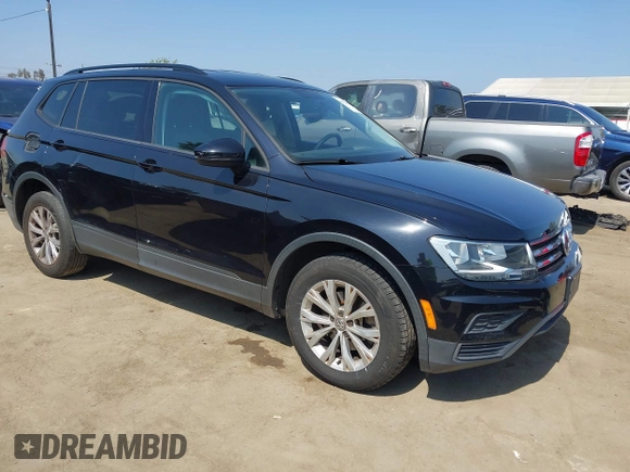 2018 Volkswagen Tiguan S with VIN 3VV1B7AX7JM092033, listed as a IAAI auction lot 42373619 with 124,775 mi miles and . Bid and sale history available at DreamBid. Image 1.