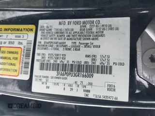 2016 Ford Fusion Energi SE Luxury with VIN 3FA6P0PU3GR166009, listed as a IAAI auction lot 41626623 with 133,596 mi miles. Bid and sale history available at carsss.com. Image 9.