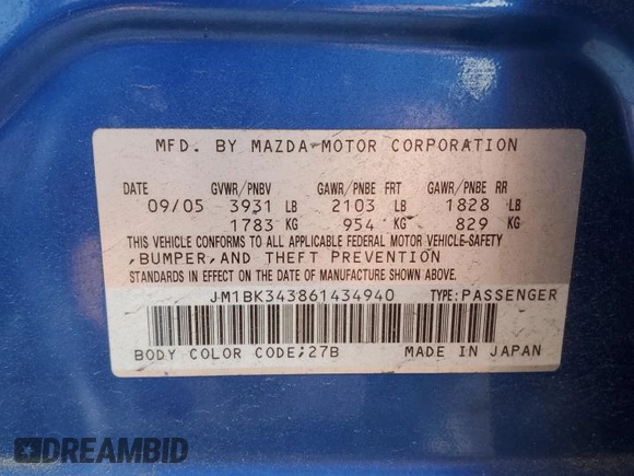 2006 Mazda 3 S Grand Touring with VIN JM1BK343861434940, listed as a Copart auction lot 63624024 with 56,737 mi miles and Salvage Title. Bid and sale history available at DreamBid. Image 12.