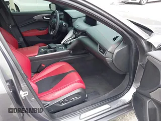 2023 Acura TLX w/A-Spec Package z VIN 19UUB6F58PA006068, wystawiony jako IAAI lot #41922648 z przebiegiem 32 779 mil mil oraz . Historia ofert i sprzedaży dostępna na DreamBid. Obrazek 5.