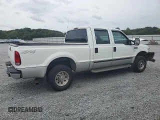 2000 Ford Super Duty F-250 XL with VIN 1FTNW21S1YED90136, listed as a Copart auction lot 71520914 with 378,931 mi miles and Salvage Title. Bid and sale history available at carsss.com. Image 3.