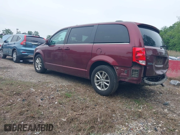 2018 Dodge Grand Caravan SXT z VIN 2C4RDGCG5JR305191, wystawiony jako IAAI lot #42269531 z przebiegiem 116 098 mil mil oraz . Historia ofert i sprzedaży dostępna na DreamBid. Obrazek 3.