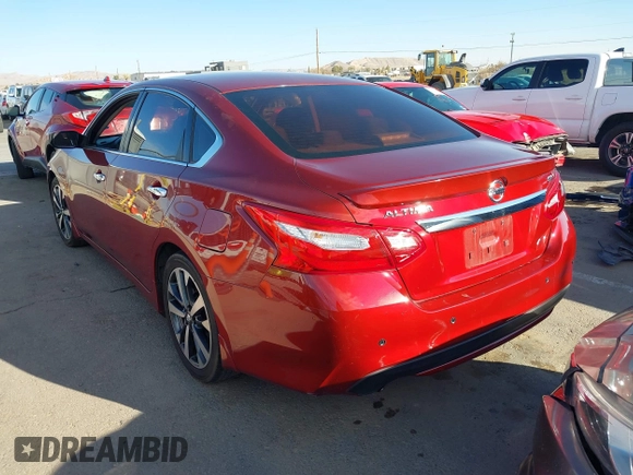 2016 Nissan Altima SR with VIN 1N4AL3AP5GC128614, listed as a IAAI auction lot 41625773 with 123,549 mi miles and . Bid and sale history available at DreamBid. Image 3.