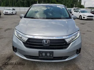 2021 Honda Odyssey Touring z VIN 5FNRL6H85MB039444, wystawiony jako Copart lot #57142205 z przebiegiem 74 228 mil mil oraz Szkoda całkowita • Salvage title. Historia ofert i sprzedaży dostępna na DreamBid. Obrazek 5.
