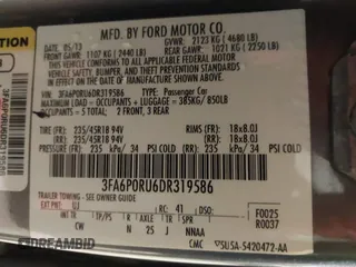 2013 Ford Fusion Titanium Hybrid with VIN 3FA6P0RU6DR319586, listed as a IAAI auction lot 42138979 with 125,388 mi miles. Bid and sale history available at carsss.com. Image 9.