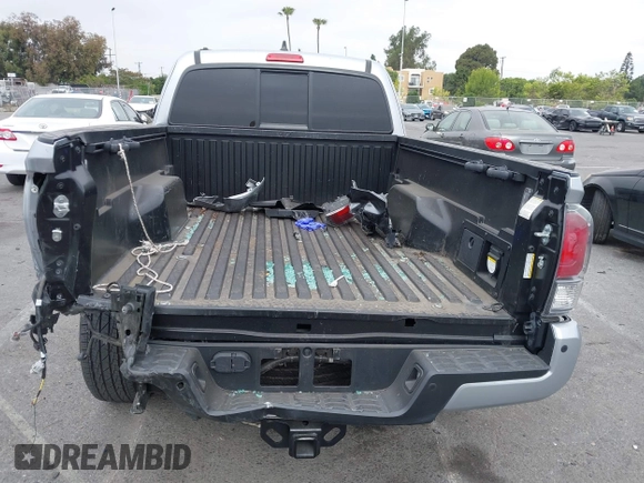 2022 Toyota Tacoma SR with VIN 3TYRZ5CN9NT022492, listed as a IAAI auction lot 42378801 with 9,312 mi miles and . Bid and sale history available at DreamBid. Image 16.