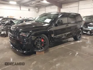 2017 Jeep Grand Cherokee SRT with VIN 1C4RJFDJ9HC739324, listed as a IAAI auction lot 40898998 with 92,547 mi miles. Bid and sale history available at carsss.com. Image 17.