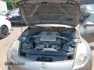 2008 Nissan 350Z Nismo z VIN JN1BZ34E88M753028, wystawiony jako IAAI lot #42410654 z przebiegiem 122 854 mil mil oraz . Historia ofert i sprzedaży dostępna na DreamBid. Obrazek 10.