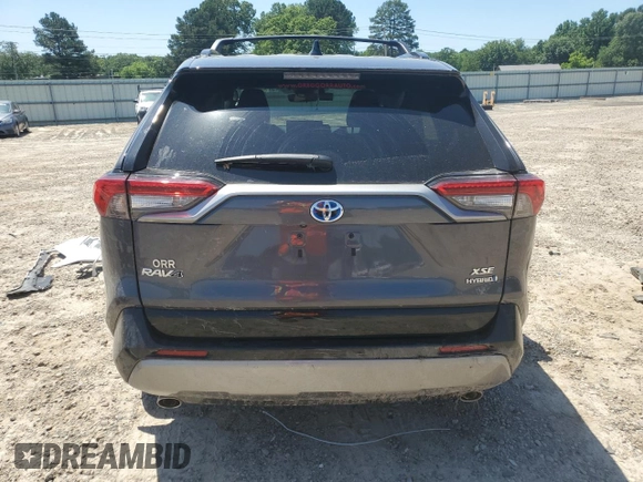 2023 Toyota RAV4 Hybrid XSE with VIN 2T3E6RFV9PW039963, listed as a Copart auction lot 57594335 with 27,486 mi miles and Salvage title. Bid and sale history available at DreamBid. Image 6.