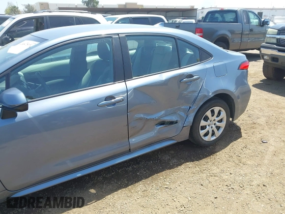 2023 Toyota Corolla LE with VIN 5YFB4MDE9PP052382, listed as a IAAI auction lot 42087565 with 41,170 mi miles and . Bid and sale history available at DreamBid. Image 6.