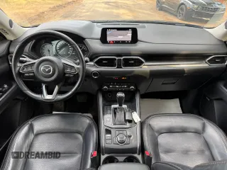 2020 Mazda CX-5 Grand Touring with VIN JM3KFADM8L0785373, listed as a Copart auction lot 50829175 with 135,736 mi miles and Clean Title. Bid and sale history available at DreamBid. Image 9.