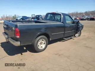 1998 Ford F-150 with VIN 1FTRF18L7WNA73159, listed as a Copart auction lot 48682685 with 71,261 mi miles and Salvage title. Bid and sale history available at DreamBid. Image 3.