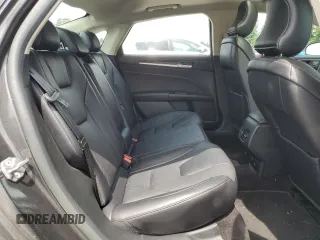 2017 Ford Fusion Titanium z VIN 3FA6P0K95HR139060, wystawiony jako Copart lot #62200755 z przebiegiem 106 133 mil mil oraz Szkoda całkowita • Salvage title. Historia ofert i sprzedaży dostępna na DreamBid. Obrazek 10.