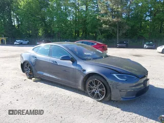 2022 Tesla Model S with VIN 5YJSA1E57NF479056, listed as a IAAI auction lot 42091009 with 78,272 mi miles and . Bid and sale history available at DreamBid. Image 1.
