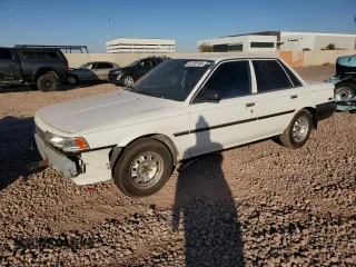 1989 Toyota Camry z VIN 4T1SV24E5KU019985, wystawiony jako Copart lot #81200104 z przebiegiem 207 103 mil mil oraz Szkoda całkowita • Salvage title. Historia ofert i sprzedaży dostępna na DreamBid. Obrazek 1.
