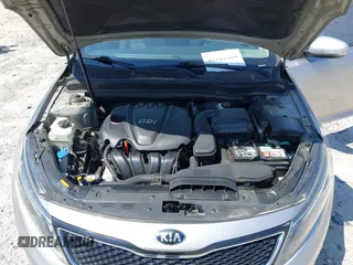 2014 Kia Optima LX with VIN KNAGM4A79E5470198, listed as a IAAI auction lot 42142484 with 169,140 mi miles. Bid and sale history available at carsss.com. Image 10.