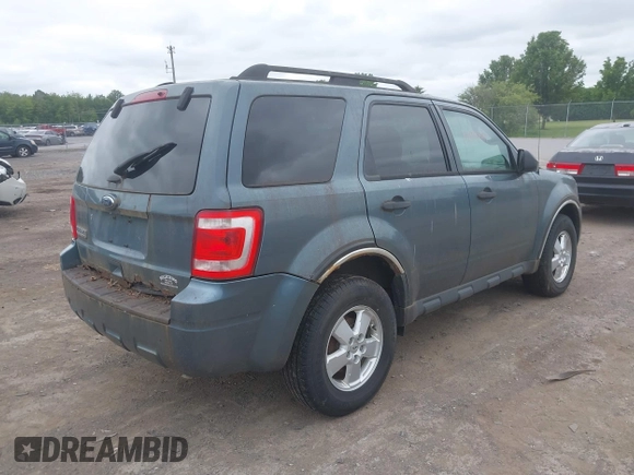 2012 Ford Escape XLT with VIN 1FMCU9D7XCKC22949, listed as a IAAI auction lot 42524904 with 106,430 mi miles and . Bid and sale history available at DreamBid. Image 4.