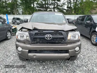 2011 Toyota Tacoma with VIN 3TMLU4EN8BM062971, listed as a Copart auction lot 60919195 with 219,061 mi miles and Clean title. Bid and sale history available at DreamBid. Image 5.
