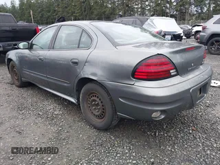 2004 Pontiac Grand Am SE with VIN 1G2NE52F94M530881, listed as a IAAI auction lot 41648302 with 116,540 mi miles. Bid and sale history available at carsss.com. Image 3.