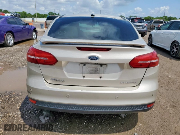 2018 Ford Focus Titanium z VIN 1FADP3J26JL279443, wystawiony jako Copart lot #58837435 z przebiegiem 136 538 mil mil oraz Szkoda całkowita • Salvage title. Historia ofert i sprzedaży dostępna na DreamBid. Obrazek 6.