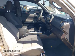 2017 Toyota Tacoma SR5 z VIN 3TMCZ5AN4HM052380, wystawiony jako IAAI lot #42277918 z przebiegiem 62 238 mil mil oraz . Historia ofert i sprzedaży dostępna na DreamBid. Obrazek 5.