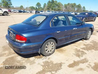 2003 Hyundai Sonata with VIN KMHWF25SX3A790609, listed as a IAAI auction lot 41716098 with 216,240 mi miles. Bid and sale history available at carsss.com. Image 4.