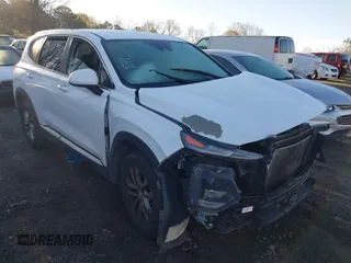 2019 Hyundai Santa Fe SE with VIN 5NMS2CAD6KH114027, listed as a IAAI auction lot 41874556 with 125,729 mi miles. Bid and sale history available at carsss.com. Image 1.