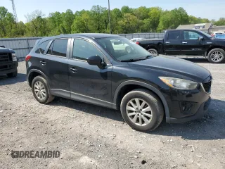 2015 Mazda CX-5 Touring with VIN JM3KE4CY6F0434538, listed as a Copart auction lot 54966145 with 209,447 mi miles and Clean Title. Bid and sale history available at DreamBid. Image 4.