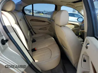 2004 Jaguar X-Type with VIN SAJEA51C64WD66013, listed as a Copart auction lot 50635615 with 47,365 mi miles and Salvage Title. Bid and sale history available at carsss.com. Image 10.